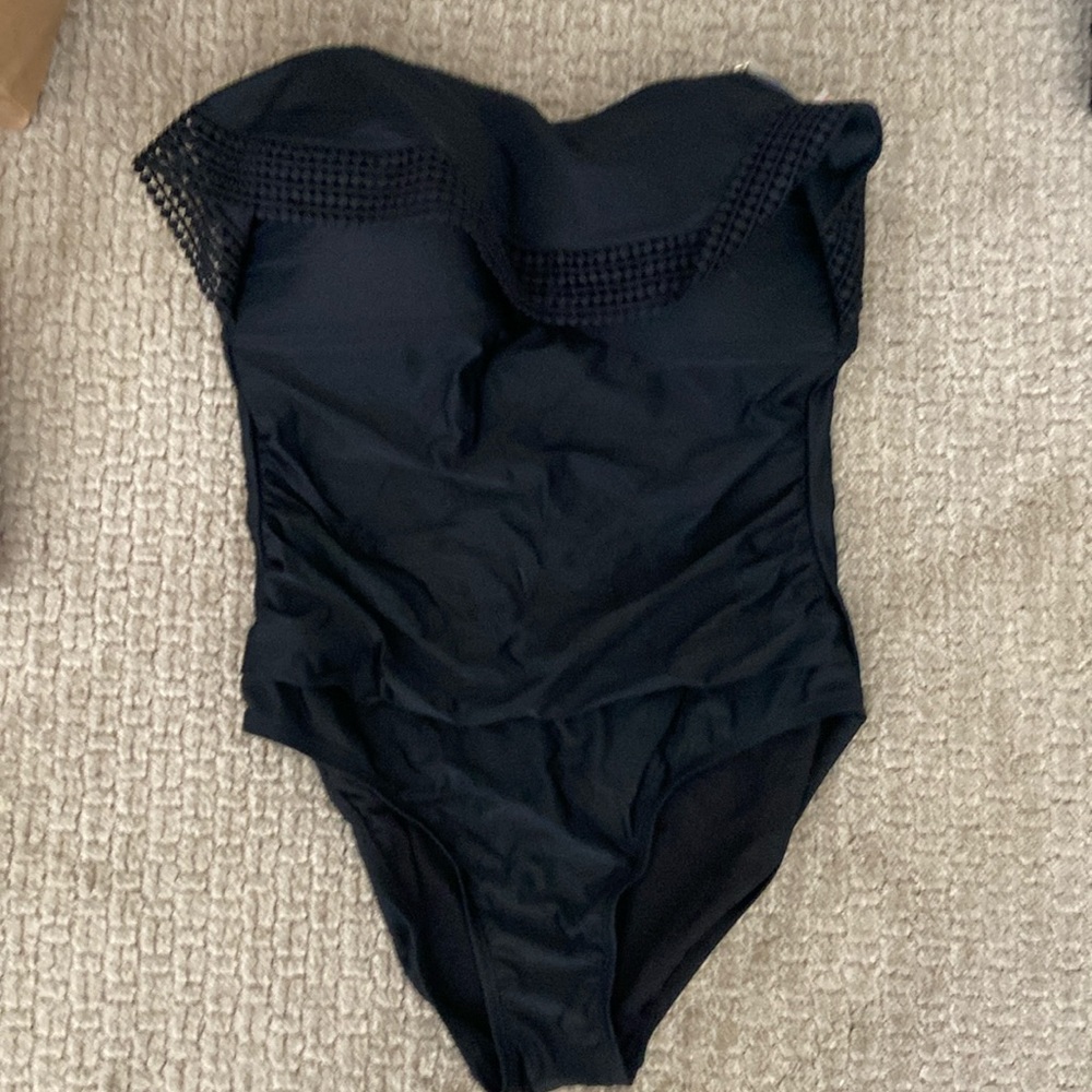 Kona Sol black women’s swimsuit.
